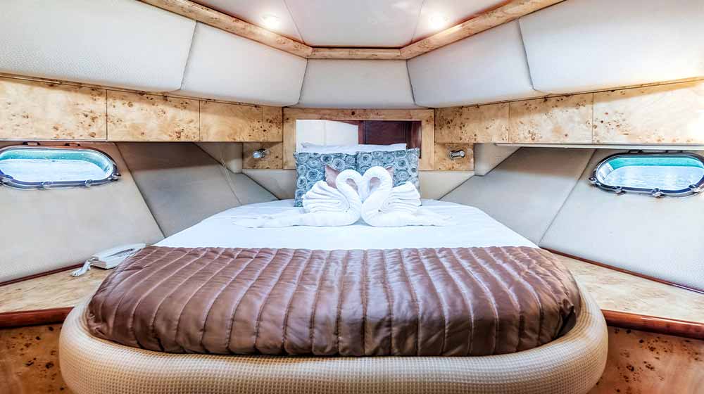 boat bow bedroom of 61ft luxury boat with sleek interiors